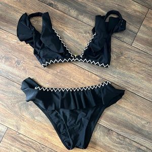 Tularosa (Revolve) 2 piece black with zig zag white trim. Excellent condition
